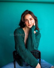 Charming Eli Avrram in a Sheer Bralette with Green Cardigan and Blue Denim Pictures 04