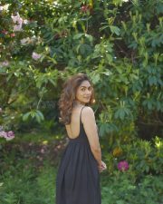 Charming Mrunal Thakur in a Black Spaghetti Strap Bodycon Dress Pictures 06