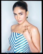 Chic Actress Mrunal Thakur in a Blue White Striped Strapless Gown Photos 02