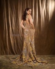 Classy Pragya Jaiswal in a Sleeveless Metallic Gold Embellished Long Dress Pictures 08