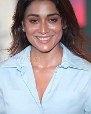 Confident Actress Shriya Saran in a Light blue button down dress Photos 03