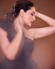 Confident Pragya Jaiswal in a Black One Shoulder Sleeveless Mini Dress Photos 03