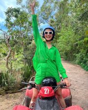 Confident Pragya Jaiswal in a Stylish Green Shorts with a Printed Bikini Photos 02