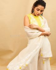 Cute Anupama Parameswaran in a White and Yellow Embroidered Lehenga with Sleeveless Halter Neck Blouse Photos 01