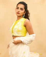 Cute Anupama Parameswaran in a White and Yellow Embroidered Lehenga with Sleeveless Halter Neck Blouse Photos 04
