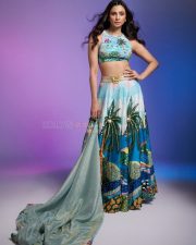 Dazzling Actress Daisy Shah in a Tropical Print Embroidered Lehenga Photos 02