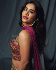 Dazzling Actress Nabha Natesh in a Magenta Embroidered Lehenga Photos 02