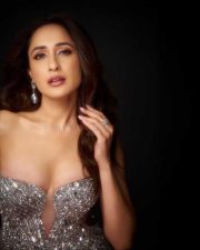 Dazzling Pragya Jaiswal in a Silver Embellished Shimmering Sleeveless Gown Photos 01