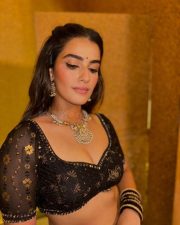 Double iSmart Heroine Kavya Thapar in a Sexy Black Lehenga Pictures 01