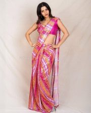 Dream Girl Vedhika Kumar Navel in a Vibrant Pink Orange and White Saree with a Sleeveless Blouse Pictures 02