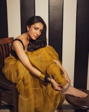 Dreamy Beauty Neha Shetty in a Golden Saree with Black Sleeveless Blouse Photos 05