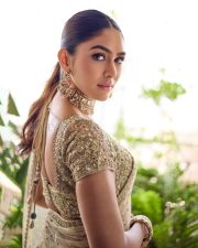 Elegant Actress Mrunal Thakur in a Ivory Embellished Ruffle Saree Photos 02