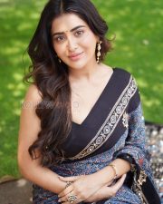 Elegant Actress Rashi Singh in a Black Blouse Dark Printed Saree Photos 02