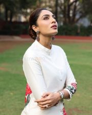 Elegant Actress Sobhita Dulipala in a white kurta with pink floral accents Photos 01
