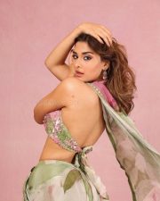 Elegant Beauty Saiee Manjrekar in a Vibrant Floral Green and Pink Saree with a Sleeveless Blouse Photos 03