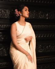 Elegant Heroine Anupama Parameswaran in a Cream Handover Floral Embroidered Saree Photos 01