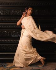 Elegant Heroine Anupama Parameswaran in a Cream Handover Floral Embroidered Saree Photos 07