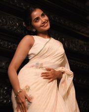 Elegant Heroine Anupama Parameswaran in a Cream Handover Floral Embroidered Saree Photos 08