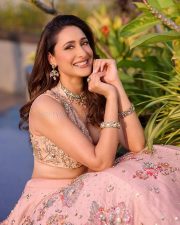 Elegant Pragya Jaiswal in a Regal Blush Pink Embroidered Lehenga Pictures 04