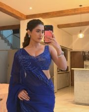 Elegant Rashi Singh in a Royal Blue Saree with a Sleeveless Deep Neck Blouse Photos 01
