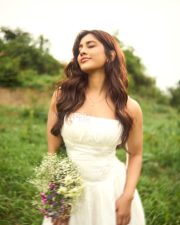 Elegant Tollywood Actress Nabha Natesh in a White Mini Dress Photos 06