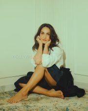 Enchanting Actress Elli AvrRam in a White Cropped Shirt and Black Satin Maxi Skirt Photos 02