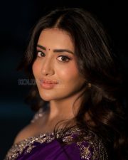 Enchanting Actress Rashi Singh in a Purple Embroidered Saree Photos 01