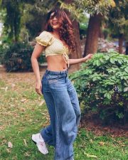 Enchanting Actress Srijita Ghosh in a yellow polka dot off shoulder crop top and denim photos 13