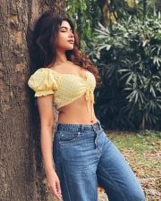 Enchanting Actress Srijita Ghosh in a yellow polka dot off shoulder crop top and denim photos 15