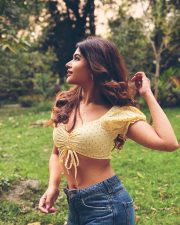 Enchanting Actress Srijita Ghosh in a yellow polka dot off shoulder crop top and denim photos 18