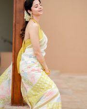 Enchanting Actress Vedhika in a White floral printed saree with yellow halter blouse Photos 01 Enchanting Actress Vedhika in a White floral printed saree with yellow halter blouse Photos 01