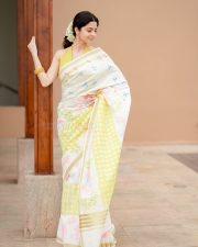 Enchanting Actress Vedhika in a White floral printed saree with yellow halter blouse Photos 03 Enchanting Actress Vedhika in a White floral printed saree with yellow halter blouse Photos 03