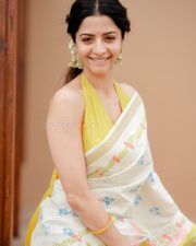 Enchanting Actress Vedhika in a White floral printed saree with yellow halter blouse Photos 04 Enchanting Actress Vedhika in a White floral printed saree with yellow halter blouse Photos 04