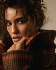Enigmatic Actress Kavya Thapar in a Brown Plaid Oversized Coat Photos 01