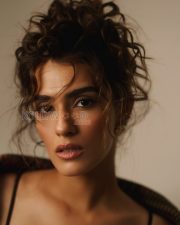 Enigmatic Actress Kavya Thapar in a Brown Plaid Oversized Coat Photos 02