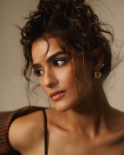 Enigmatic Actress Kavya Thapar in a Brown Plaid Oversized Coat Photos 04
