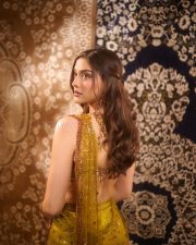 Ghani Heroine Saiee Manjrekar in a Green Red Gold Satin Silk Saree with an Embroidered Sleeveless Blouse Pictures 03