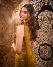 Ghani Heroine Saiee Manjrekar in a Green Red Gold Satin Silk Saree with an Embroidered Sleeveless Blouse Pictures 04