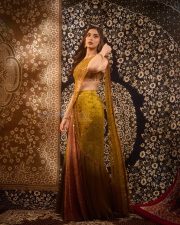 Ghani Heroine Saiee Manjrekar in a Green Red Gold Satin Silk Saree with an Embroidered Sleeveless Blouse Pictures 08