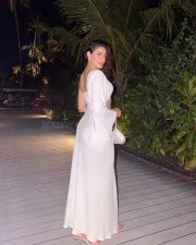 Glamorous Actress Pragya Jaiswal in a White One Shoulder Crop Top And Maxi Skirt Photos 01