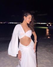Glamorous Actress Pragya Jaiswal in a White One Shoulder Crop Top And Maxi Skirt Photos 02