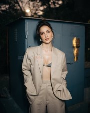 Glamorous Elli AvrRam in a Green Bralette with Cream Jacket and Matching Pant Photos 03