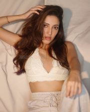 Glamorous Neha Shetty in a Lace Sleeveless White Bralette and Trousers Photos 05