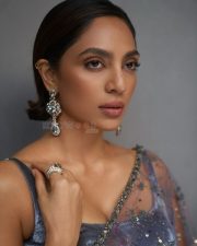Glamorous Sobhita Dhulipala Cleavage in a blue sequin saree Photos 02
