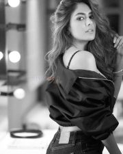 Glamorous and Sexy Mrunal Thakur in a Black Top with High Waisted Jeans Black and White Photos 02