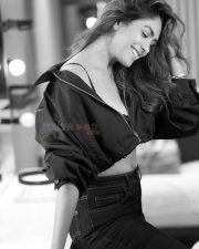 Glamorous and Sexy Mrunal Thakur in a Black Top with High Waisted Jeans Black and White Photos 04