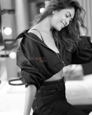 Glamorous and Sexy Mrunal Thakur in a Black Top with High Waisted Jeans Black and White Photos 04