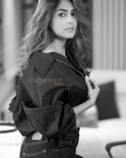 Glamorous and Sexy Mrunal Thakur in a Black Top with High Waisted Jeans Black and White Photos 07
