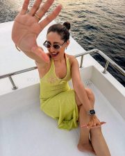Glowing Pragya Jaiswal in a Lime Yellow Knit Maxi Dress with a Thigh Slit and Bust Cutout Photos 04