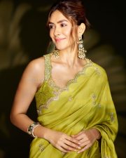 Gorgeous Mrunal Thakur in a Lime Green Silk Saree with a Sleeveless Cropped Blouse Pictures 01